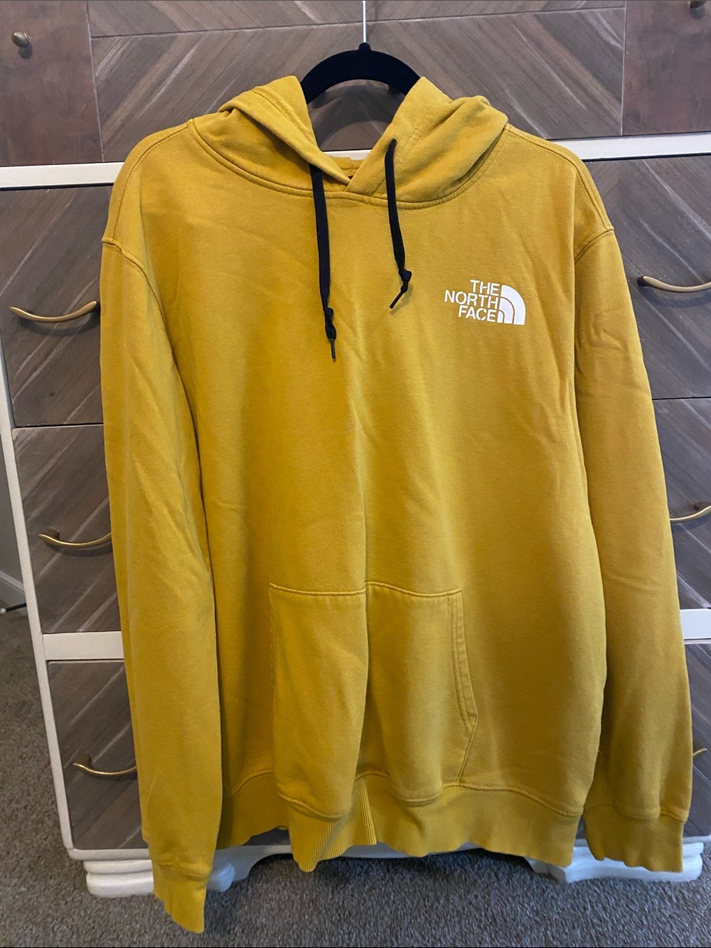 The North Face Men’s Mustard Yellow Pullover Hoodie with Black Drawstrings